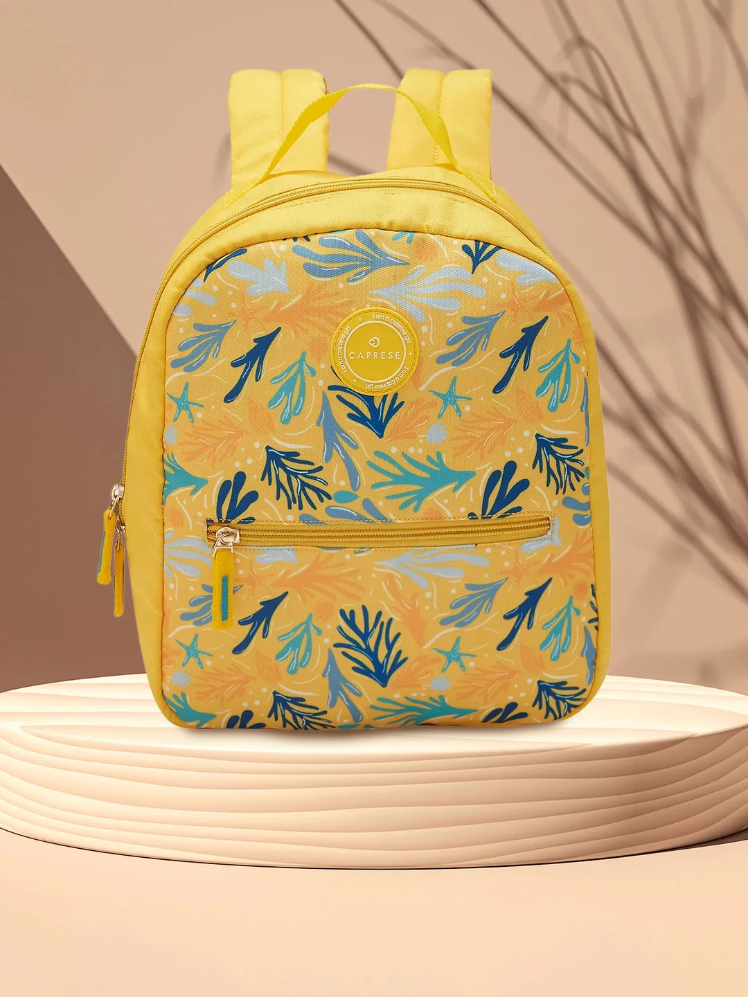 Caprese Xenia Backpack Small Yellow Printed