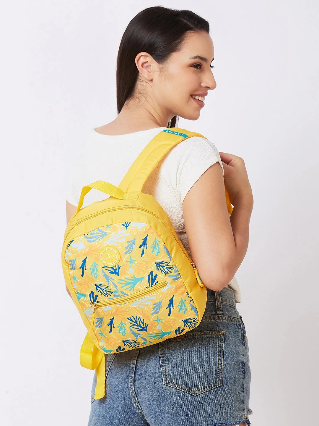 Caprese Xenia Backpack Small Yellow Printed